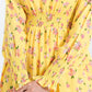 Yellow dress with pink floral pattern 