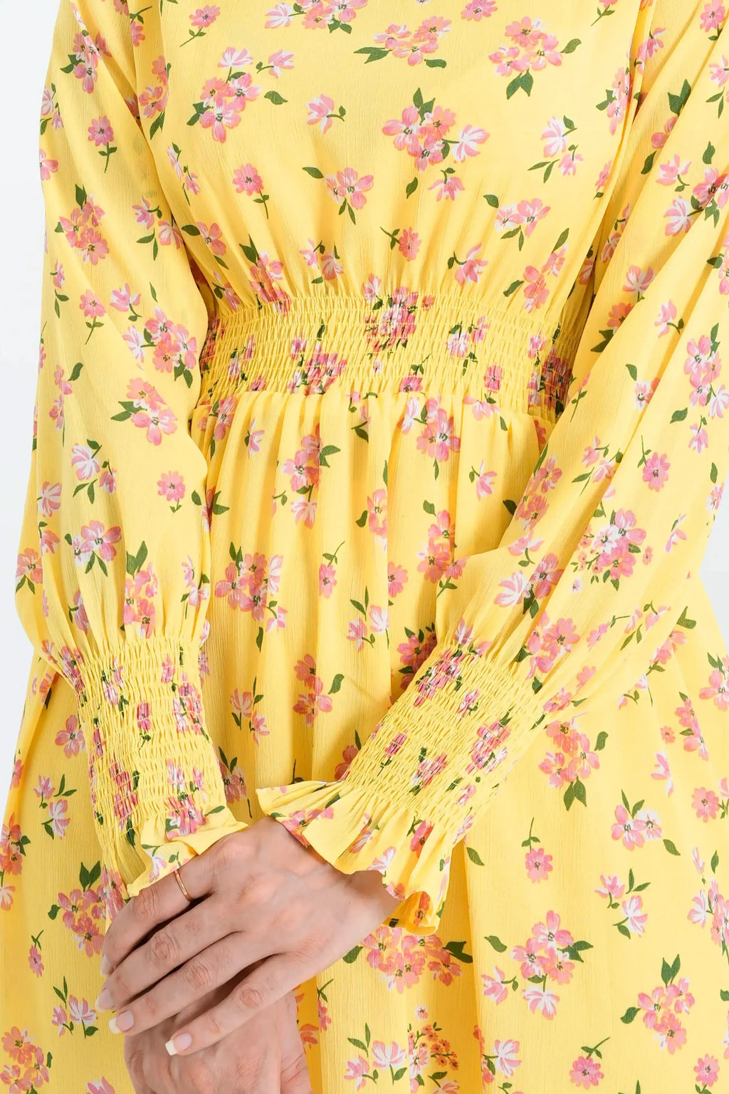 Yellow dress with pink floral pattern 