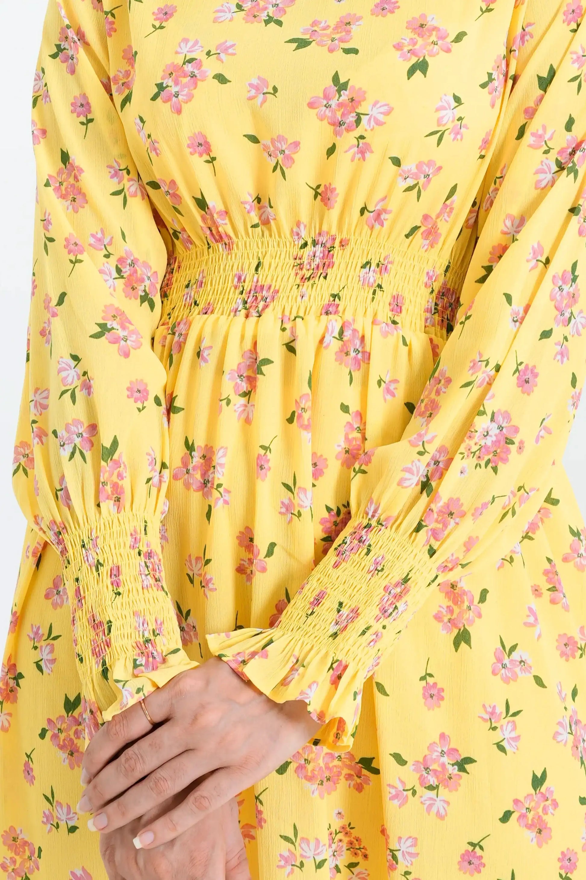 Yellow dress with pink floral pattern 
