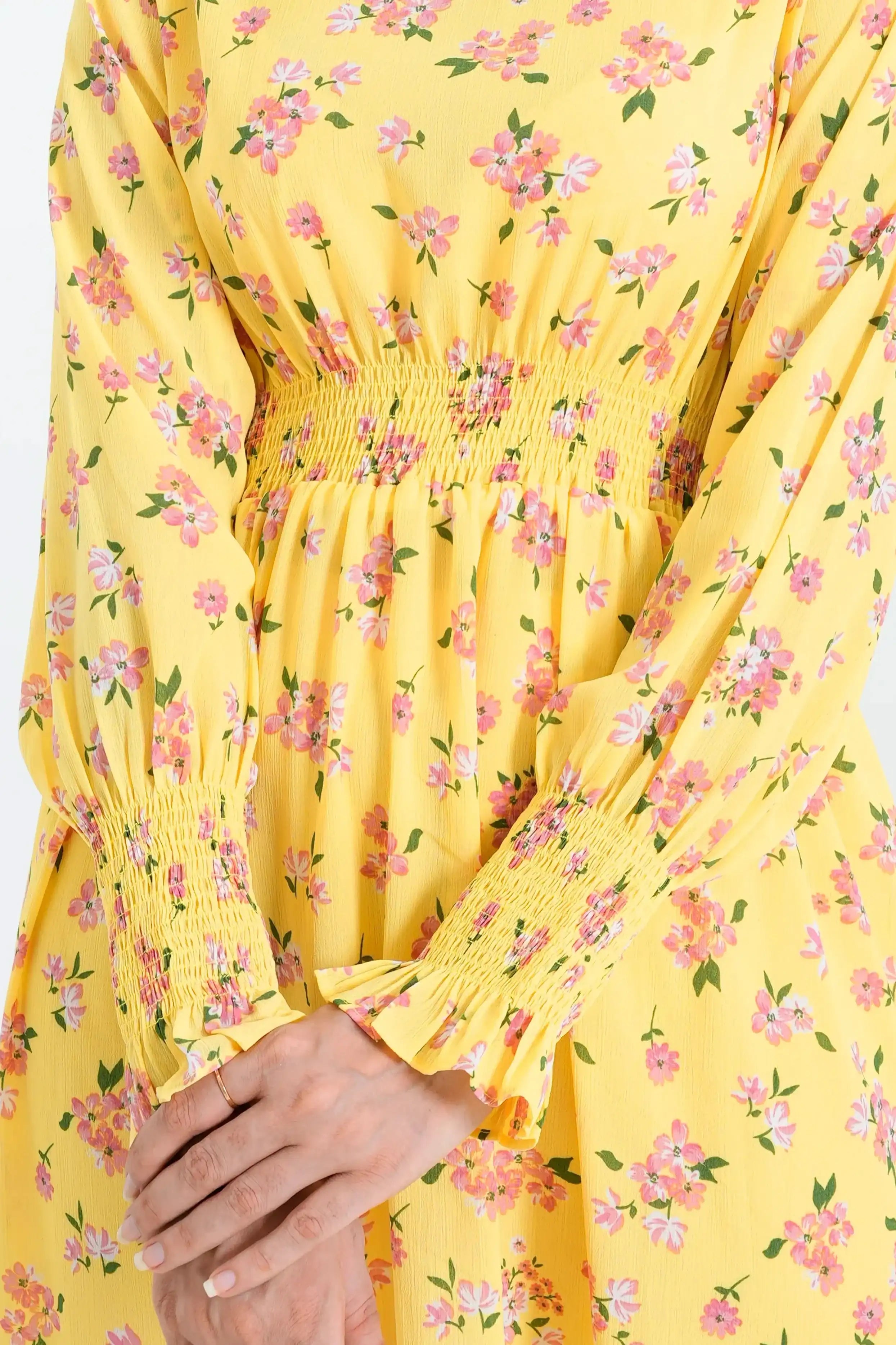 Yellow dress with pink floral pattern 