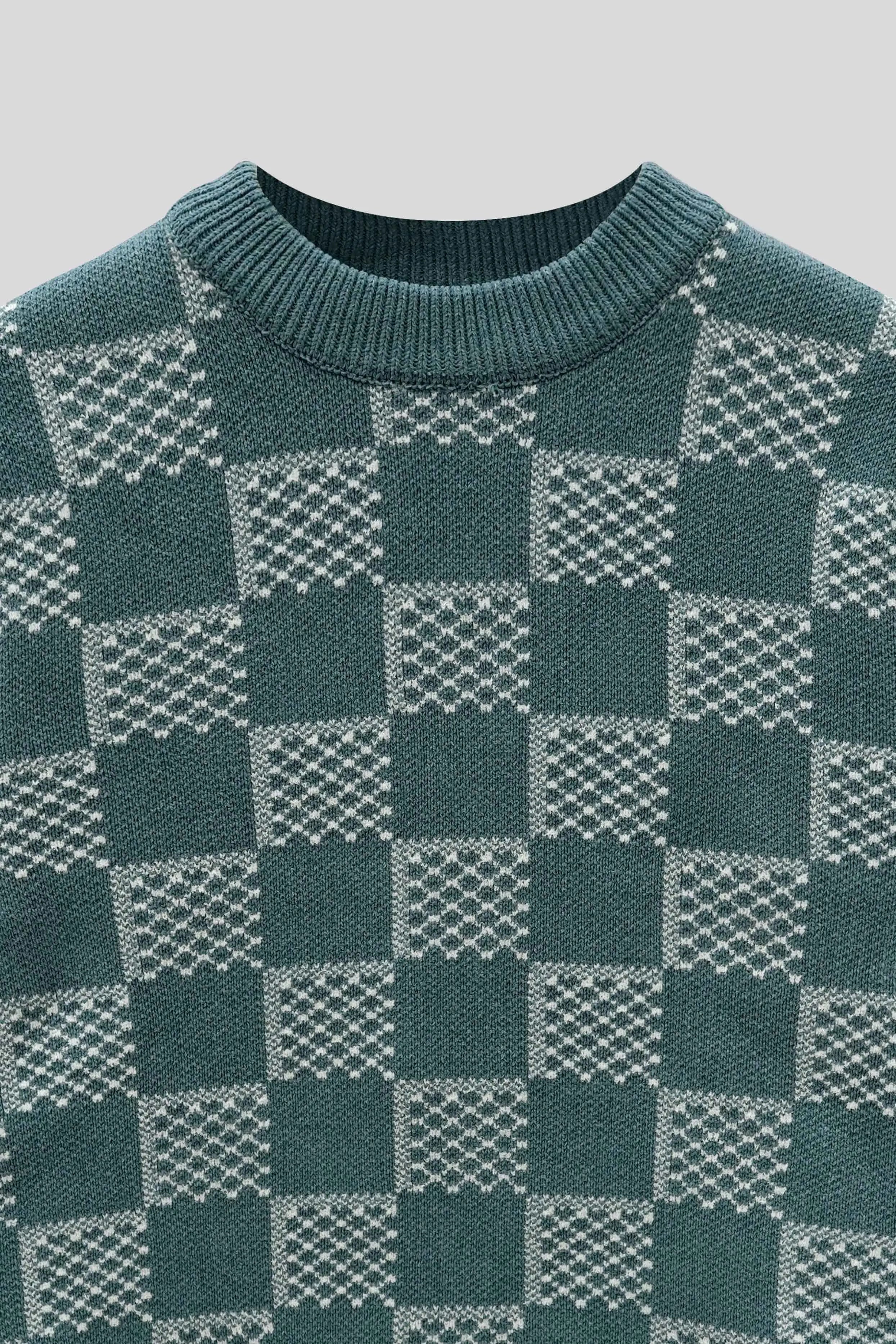 Pattern close-up highlighting the knit texture of the stone wool cardigan, blue