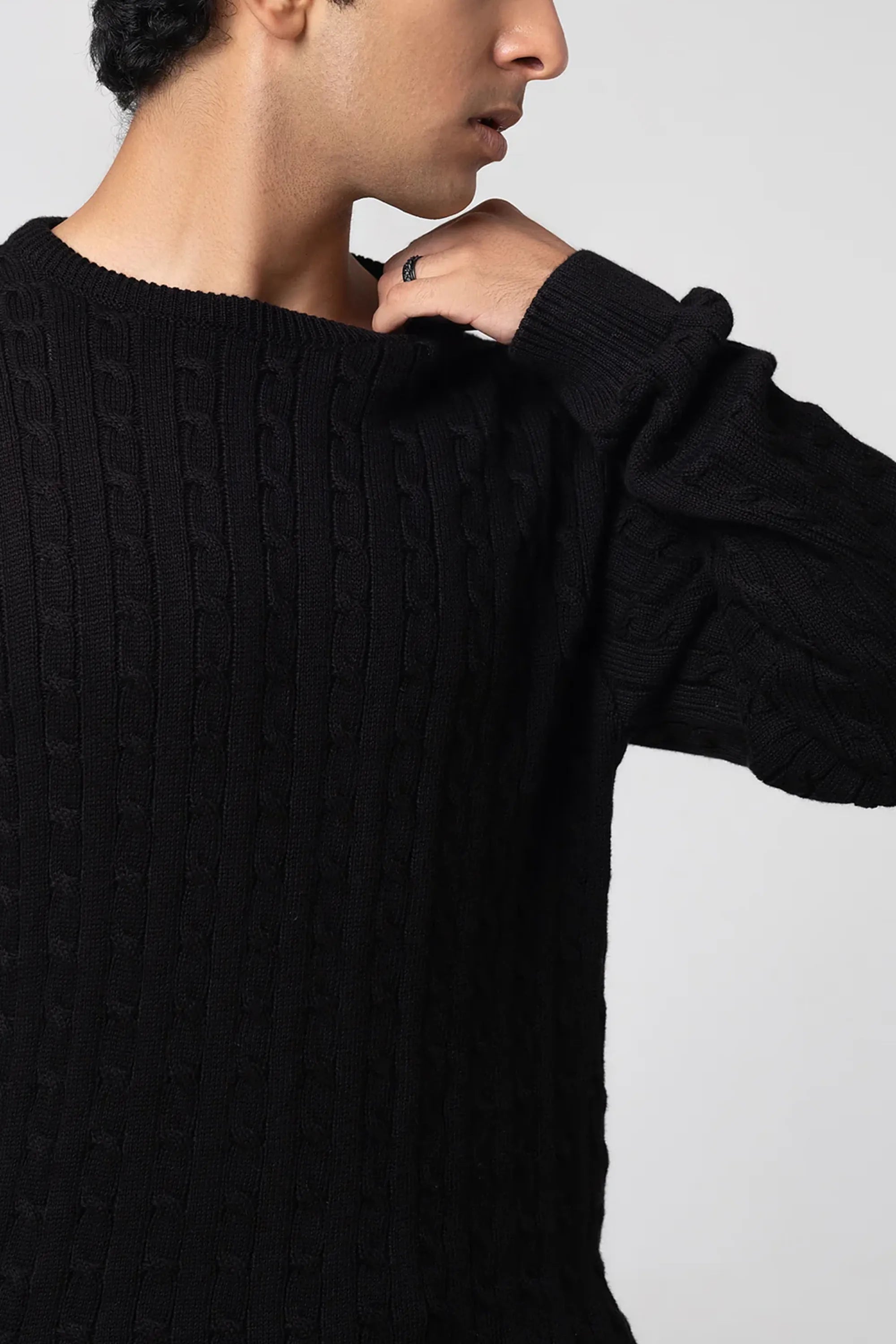 side angle view of men black crew neck knit sweater